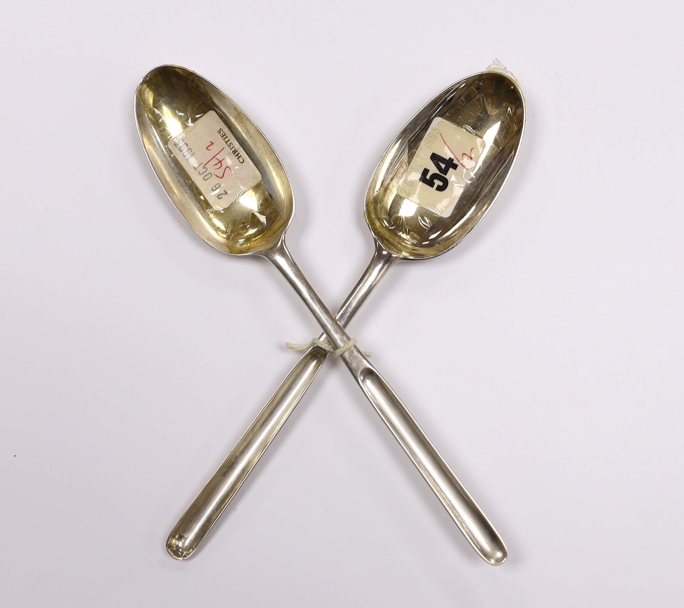 Two 18th century silver combination marrow scoop spoons, London, 1735 and James Wilks, London, 1729?, longest 21.2cm, 97 grams.